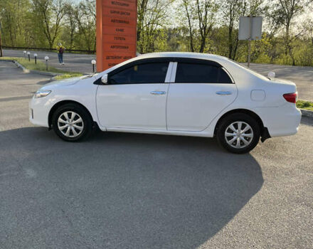 Белый Тойота Королла, объемом двигателя 1.3 л и пробегом 184 тыс. км за 7000 $, фото 5 на Automoto.ua