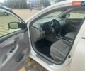Білий Тойота Королла, об'ємом двигуна 1.6 л та пробігом 148 тис. км за 9300 $, фото 6 на Automoto.ua