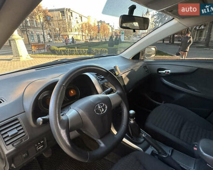 Белый Тойота Королла, объемом двигателя 1.3 л и пробегом 175 тыс. км за 7800 $, фото 9 на Automoto.ua