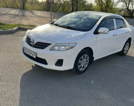 Белый Тойота Королла, объемом двигателя 1.3 л и пробегом 184 тыс. км за 7000 $, фото 1 на Automoto.ua