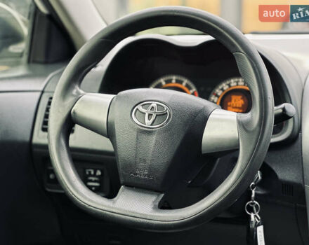 Білий Тойота Королла, об'ємом двигуна 1.33 л та пробігом 243 тис. км за 7399 $, фото 28 на Automoto.ua