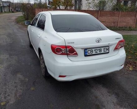 Білий Тойота Королла, об'ємом двигуна 1.33 л та пробігом 96 тис. км за 9800 $, фото 3 на Automoto.ua