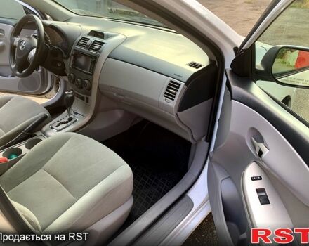 Білий Тойота Королла, об'ємом двигуна 1.8 л та пробігом 185 тис. км за 7300 $, фото 3 на Automoto.ua