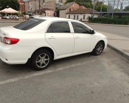 Білий Тойота Королла, об'ємом двигуна 1.33 л та пробігом 173 тис. км за 8100 $, фото 8 на Automoto.ua