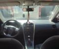 Білий Тойота Королла, об'ємом двигуна 1.33 л та пробігом 173 тис. км за 8100 $, фото 10 на Automoto.ua