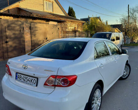 Белый Тойота Королла, объемом двигателя 1.33 л и пробегом 220 тыс. км за 6500 $, фото 10 на Automoto.ua