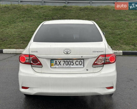 Білий Тойота Королла, об'ємом двигуна 1.33 л та пробігом 210 тис. км за 7000 $, фото 5 на Automoto.ua