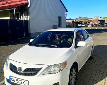 Білий Тойота Королла, об'ємом двигуна 1.8 л та пробігом 219 тис. км за 7999 $, фото 10 на Automoto.ua