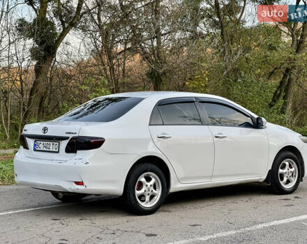 Білий Тойота Королла, об'ємом двигуна 1.33 л та пробігом 302 тис. км за 3999 $, фото 13 на Automoto.ua