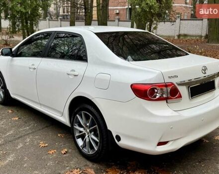 Белый Тойота Королла, объемом двигателя 1.6 л и пробегом 163 тыс. км за 9500 $, фото 2 на Automoto.ua