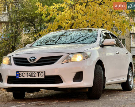 Білий Тойота Королла, об'ємом двигуна 1.33 л та пробігом 302 тис. км за 3999 $, фото 2 на Automoto.ua