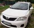 Белый Тойота Королла, объемом двигателя 1.3 л и пробегом 209 тыс. км за 6500 $, фото 1 на Automoto.ua