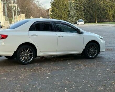 Белый Тойота Королла, объемом двигателя 1.6 л и пробегом 93 тыс. км за 10500 $, фото 6 на Automoto.ua