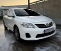 Білий Тойота Королла, об'ємом двигуна 1.33 л та пробігом 173 тис. км за 8100 $, фото 1 на Automoto.ua