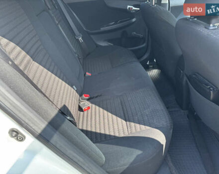 Білий Тойота Королла, об'ємом двигуна 1.33 л та пробігом 210 тис. км за 7000 $, фото 12 на Automoto.ua