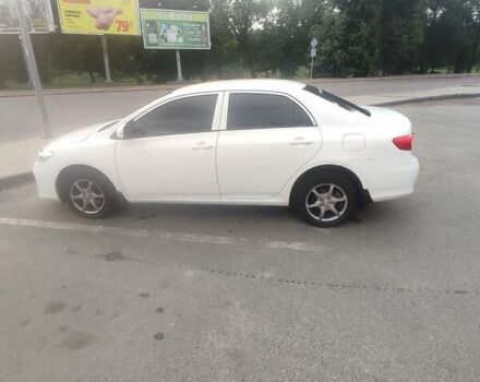 Білий Тойота Королла, об'ємом двигуна 1.33 л та пробігом 173 тис. км за 8100 $, фото 7 на Automoto.ua