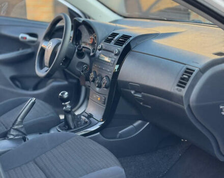 Белый Тойота Королла, объемом двигателя 1.33 л и пробегом 220 тыс. км за 6500 $, фото 21 на Automoto.ua