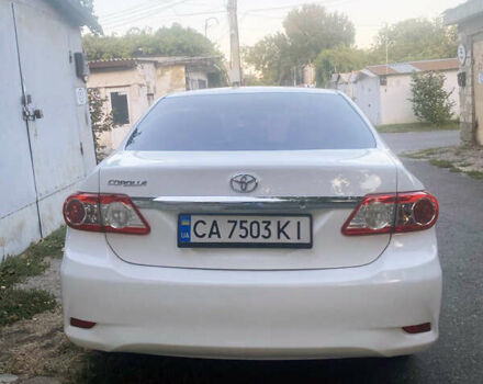 Белый Тойота Королла, объемом двигателя 1.8 л и пробегом 219 тыс. км за 7999 $, фото 6 на Automoto.ua