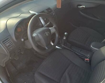 Белый Тойота Королла, объемом двигателя 1.33 л и пробегом 178 тыс. км за 8400 $, фото 6 на Automoto.ua