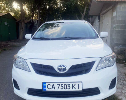 Белый Тойота Королла, объемом двигателя 1.8 л и пробегом 219 тыс. км за 7999 $, фото 1 на Automoto.ua