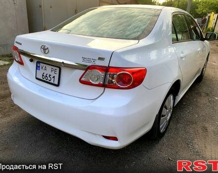 Білий Тойота Королла, об'ємом двигуна 1.8 л та пробігом 185 тис. км за 7300 $, фото 1 на Automoto.ua