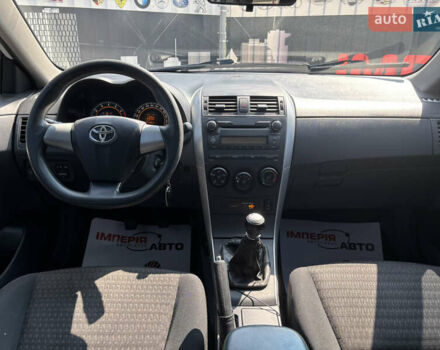 Білий Тойота Королла, об'ємом двигуна 1.33 л та пробігом 210 тис. км за 7000 $, фото 16 на Automoto.ua