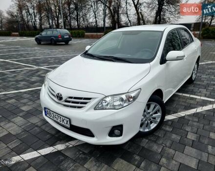 Білий Тойота Королла, об'ємом двигуна 1.6 л та пробігом 97 тис. км за 11300 $, фото 1 на Automoto.ua