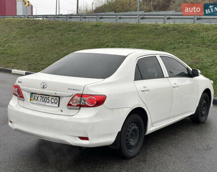 Білий Тойота Королла, об'ємом двигуна 1.33 л та пробігом 210 тис. км за 7000 $, фото 4 на Automoto.ua
