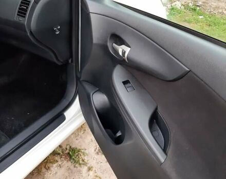 Белый Тойота Королла, объемом двигателя 1.3 л и пробегом 209 тыс. км за 6500 $, фото 11 на Automoto.ua