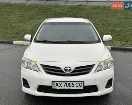 Білий Тойота Королла, об'ємом двигуна 1.33 л та пробігом 210 тис. км за 7000 $, фото 1 на Automoto.ua