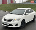 Білий Тойота Королла, об'ємом двигуна 1.33 л та пробігом 210 тис. км за 7000 $, фото 1 на Automoto.ua