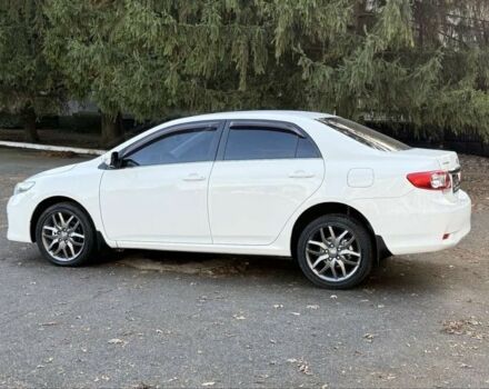 Белый Тойота Королла, объемом двигателя 1.6 л и пробегом 93 тыс. км за 10500 $, фото 5 на Automoto.ua