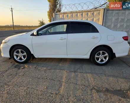 Білий Тойота Королла, об'ємом двигуна 1.6 л та пробігом 110 тис. км за 10900 $, фото 1 на Automoto.ua