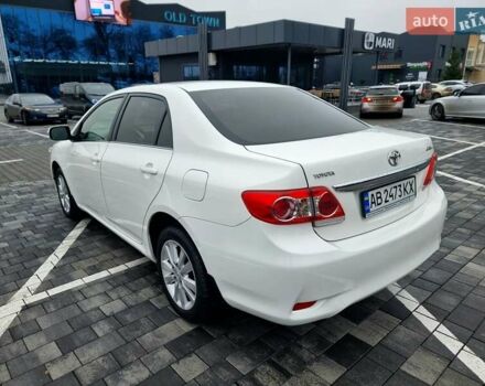Білий Тойота Королла, об'ємом двигуна 1.6 л та пробігом 97 тис. км за 11300 $, фото 22 на Automoto.ua