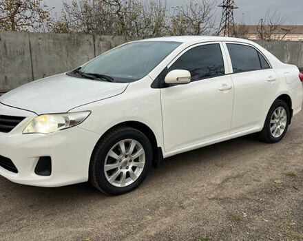 Белый Тойота Королла, объемом двигателя 1.3 л и пробегом 305 тыс. км за 8100 $, фото 1 на Automoto.ua