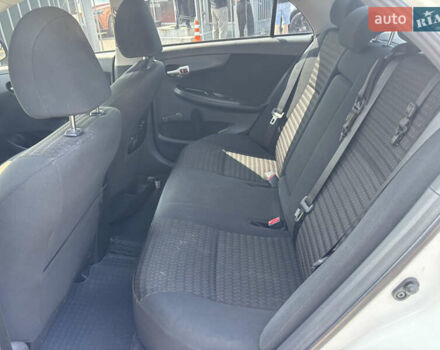 Білий Тойота Королла, об'ємом двигуна 1.33 л та пробігом 210 тис. км за 7000 $, фото 10 на Automoto.ua