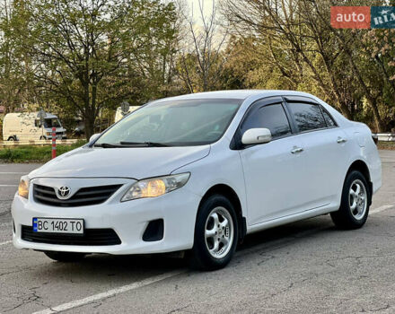 Білий Тойота Королла, об'ємом двигуна 1.33 л та пробігом 302 тис. км за 3999 $, фото 7 на Automoto.ua