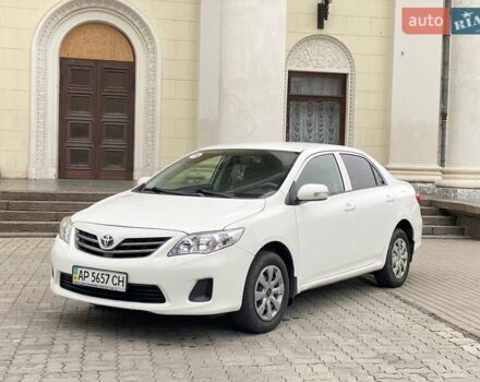 Белый Тойота Королла, объемом двигателя 1.33 л и пробегом 300 тыс. км за 5250 $, фото 1 на Automoto.ua