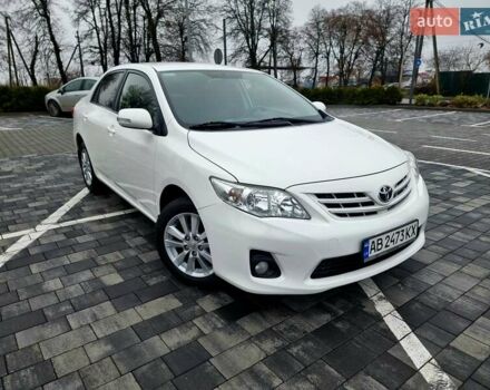 Білий Тойота Королла, об'ємом двигуна 1.6 л та пробігом 97 тис. км за 11300 $, фото 2 на Automoto.ua