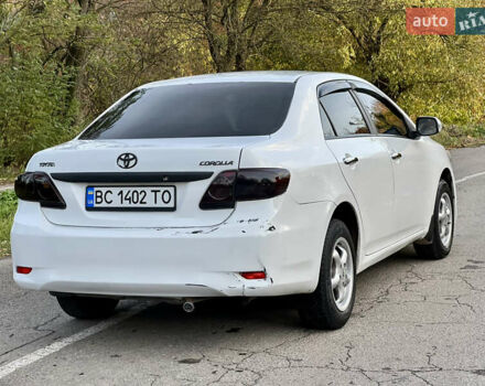 Білий Тойота Королла, об'ємом двигуна 1.33 л та пробігом 302 тис. км за 3999 $, фото 12 на Automoto.ua