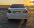 Білий Тойота Королла, об'ємом двигуна 1.6 л та пробігом 110 тис. км за 10900 $, фото 7 на Automoto.ua