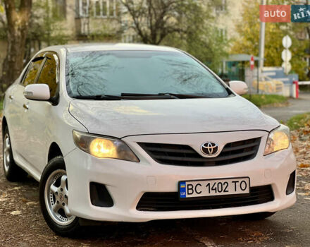 Білий Тойота Королла, об'ємом двигуна 1.33 л та пробігом 302 тис. км за 3999 $, фото 1 на Automoto.ua