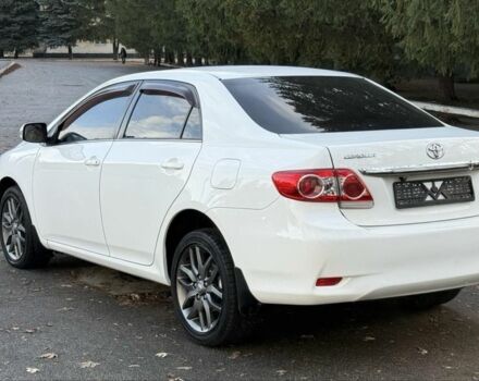 Белый Тойота Королла, объемом двигателя 1.6 л и пробегом 93 тыс. км за 10500 $, фото 4 на Automoto.ua