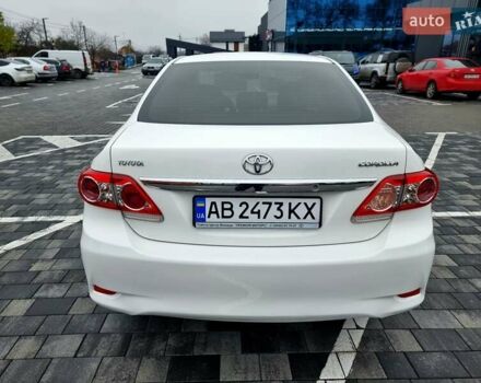 Білий Тойота Королла, об'ємом двигуна 1.6 л та пробігом 97 тис. км за 11300 $, фото 21 на Automoto.ua