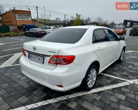 Білий Тойота Королла, об'ємом двигуна 1.6 л та пробігом 97 тис. км за 11300 $, фото 23 на Automoto.ua