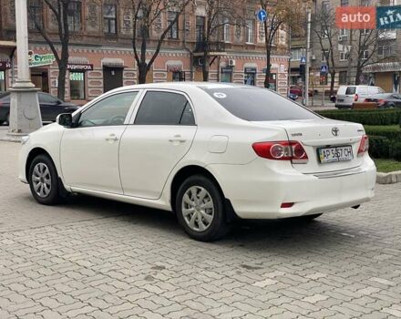 Белый Тойота Королла, объемом двигателя 1.33 л и пробегом 300 тыс. км за 5250 $, фото 5 на Automoto.ua