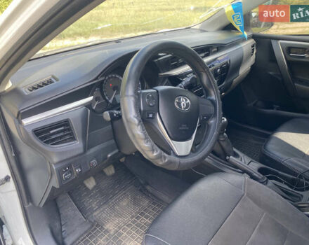 Білий Тойота Королла, об'ємом двигуна 1.33 л та пробігом 149 тис. км за 11300 $, фото 9 на Automoto.ua