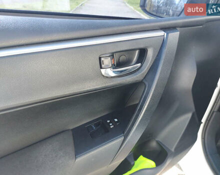 Белый Тойота Королла, объемом двигателя 1.3 л и пробегом 83 тыс. км за 12000 $, фото 11 на Automoto.ua