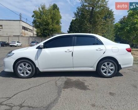 Білий Тойота Королла, об'ємом двигуна 1.6 л та пробігом 187 тис. км за 11500 $, фото 2 на Automoto.ua