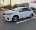Белый Тойота Королла, объемом двигателя 1.6 л и пробегом 159 тыс. км за 12800 $, фото 2 на Automoto.ua